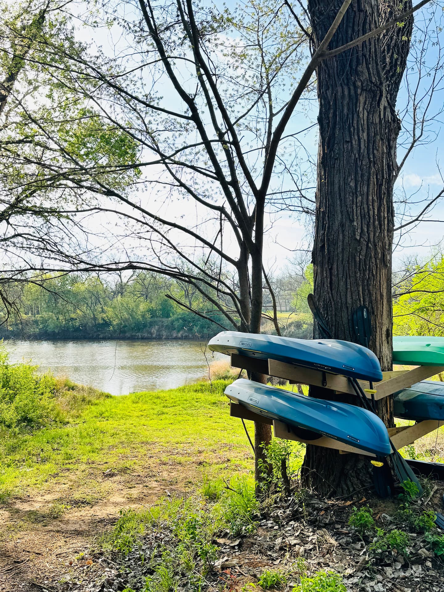 Kayaks at the river's edge